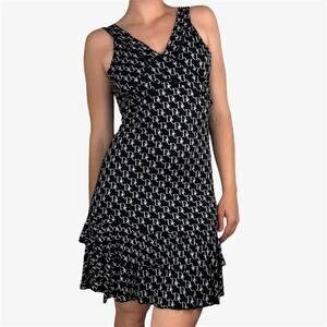 Black white sleeveless mini monogram mini dress size medium from Queen